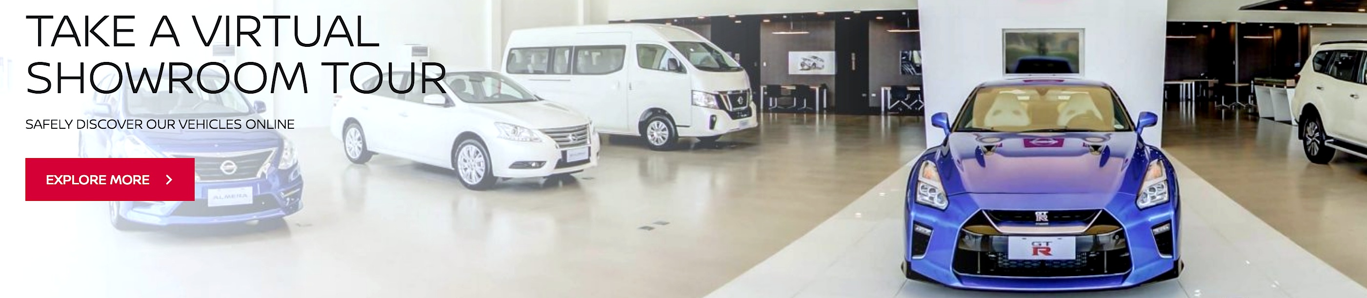 Banner with the words 'Take a Virtual Showroom Tour' with a blue GT-R vehicle.