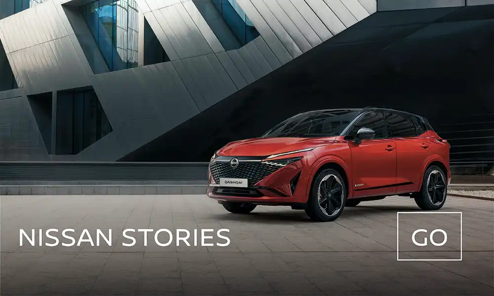 Front view of Nissan Qashqai with text that says Nissan Stories
