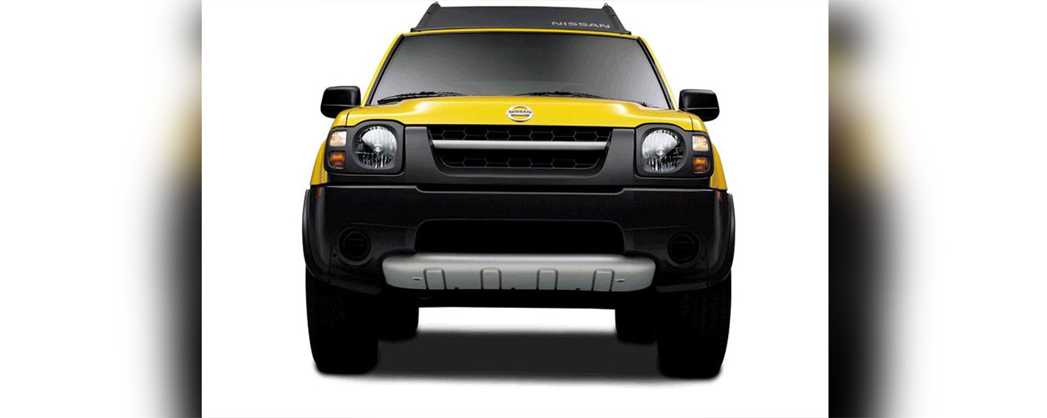 The head on view of a yellow Nissan Xterra