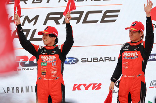 The two drivers of the #23 MOTUL AUTECH Z who took second place in the GT500 class. From left: Katsumasa Chiyo and Mitsunori Takaboshi