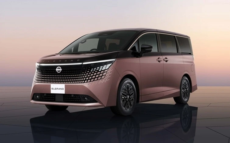 A brown tone Nissan New Elgrand is parked diagonally to the left.