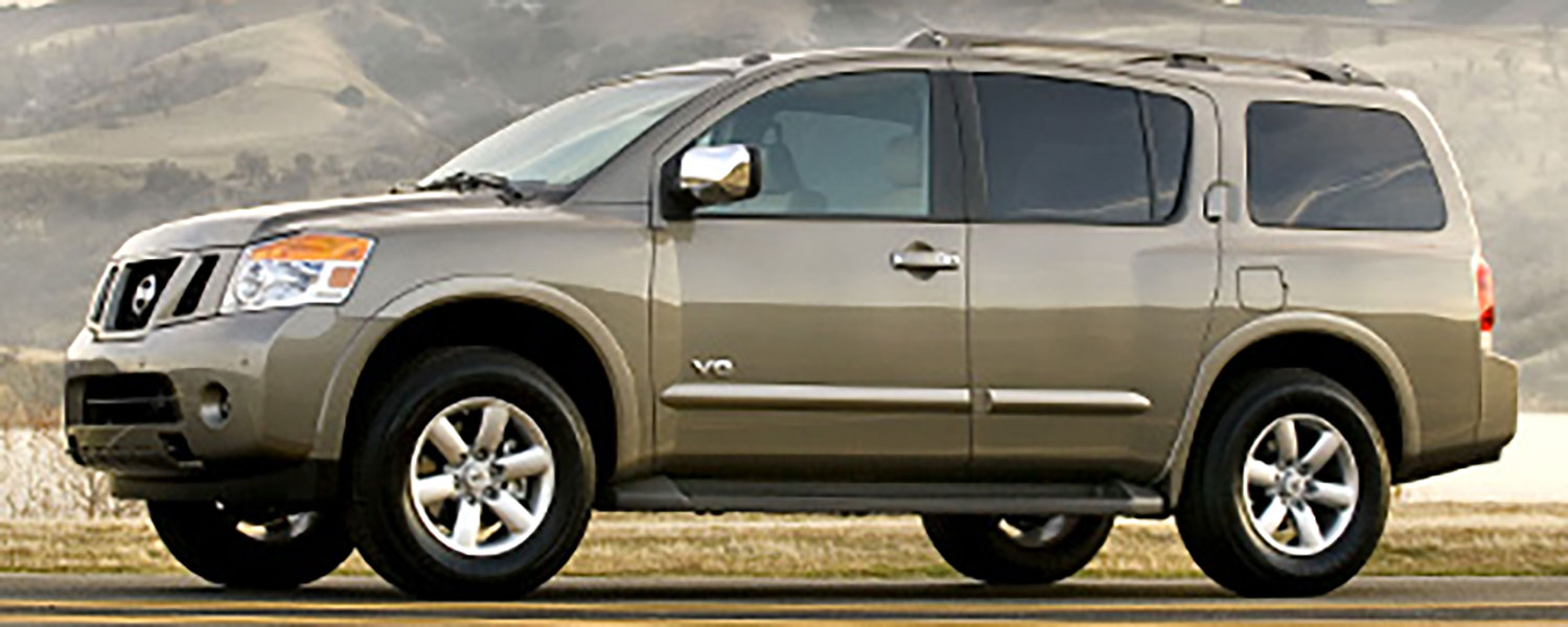 A gold Nissan Armada driver side profile