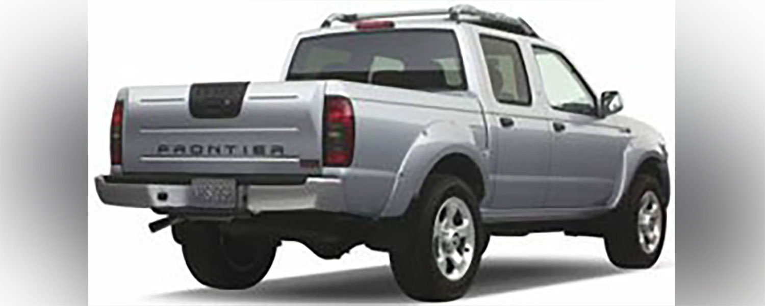 A silver 2001 Nissan Frontier
