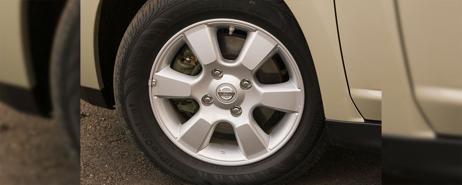 A 2009 Nissan Versa Wheel and rim