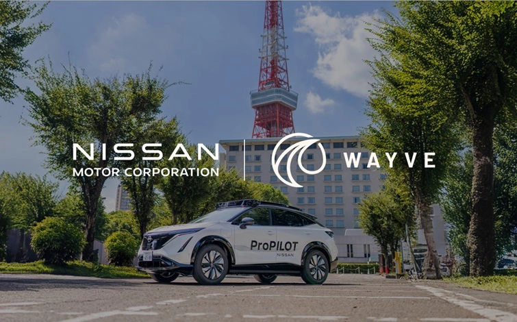 A full view of a white Nissan Ariya equipped with next-generation ProPILOT, set against the backdrop of Tokyo Tower. Prominent NISSAN and Wayve logos are displayed.