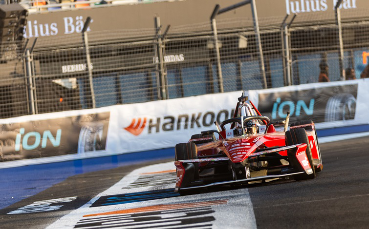 Front on shot of Norman Nato on track in the #23 Nissan e-4ORCE 05 in Mexico City with Hankook advertising visible in the background.