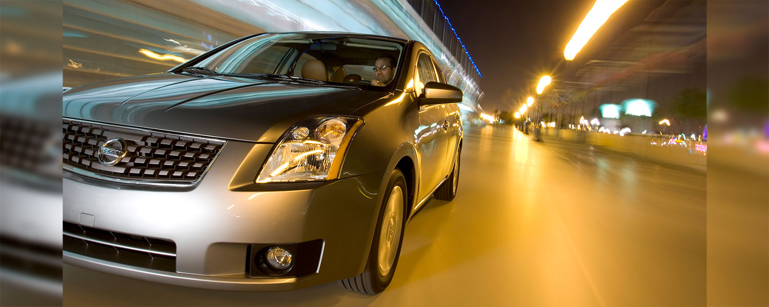 A Nissan Sentra driving towards the camera
