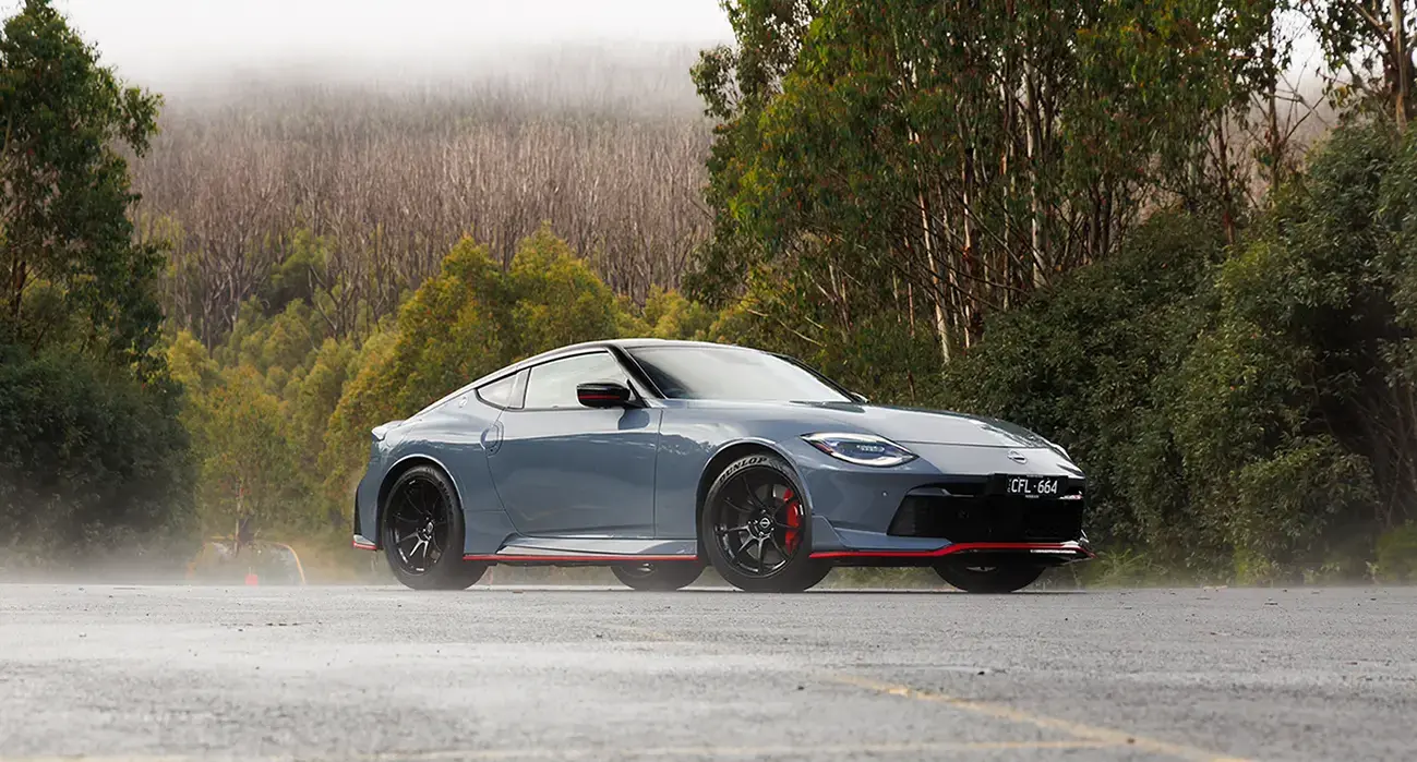 Grey 2024 Nissan Z NISMO parked in the road in mist