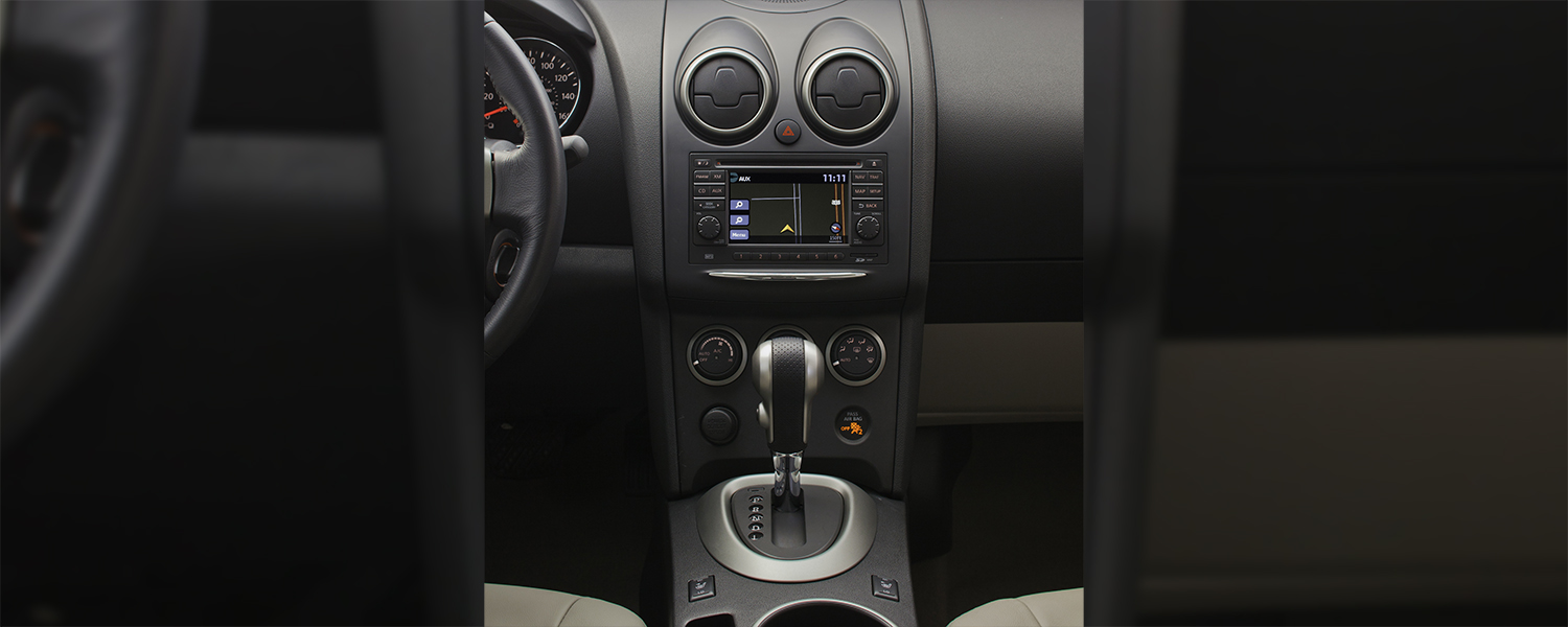 A photo of a 2012 Nissan Murano center console and gear selector