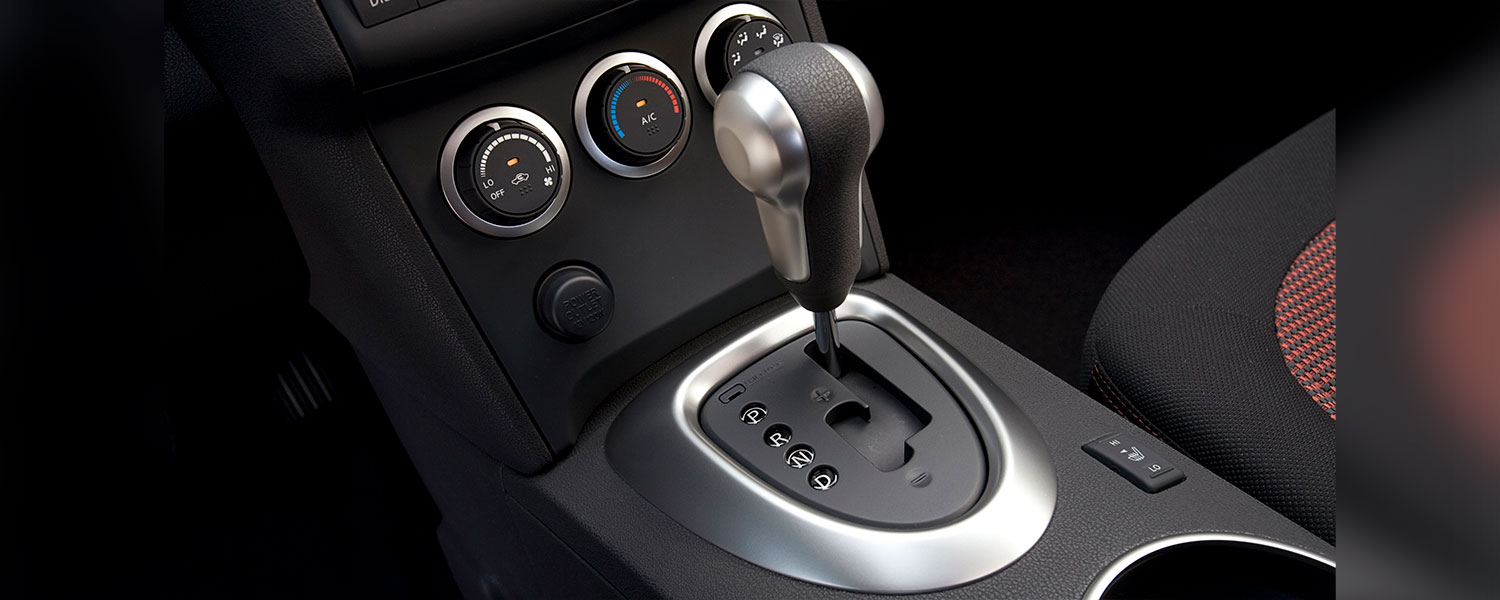 A Nissan Rogue climate controls and gear selector