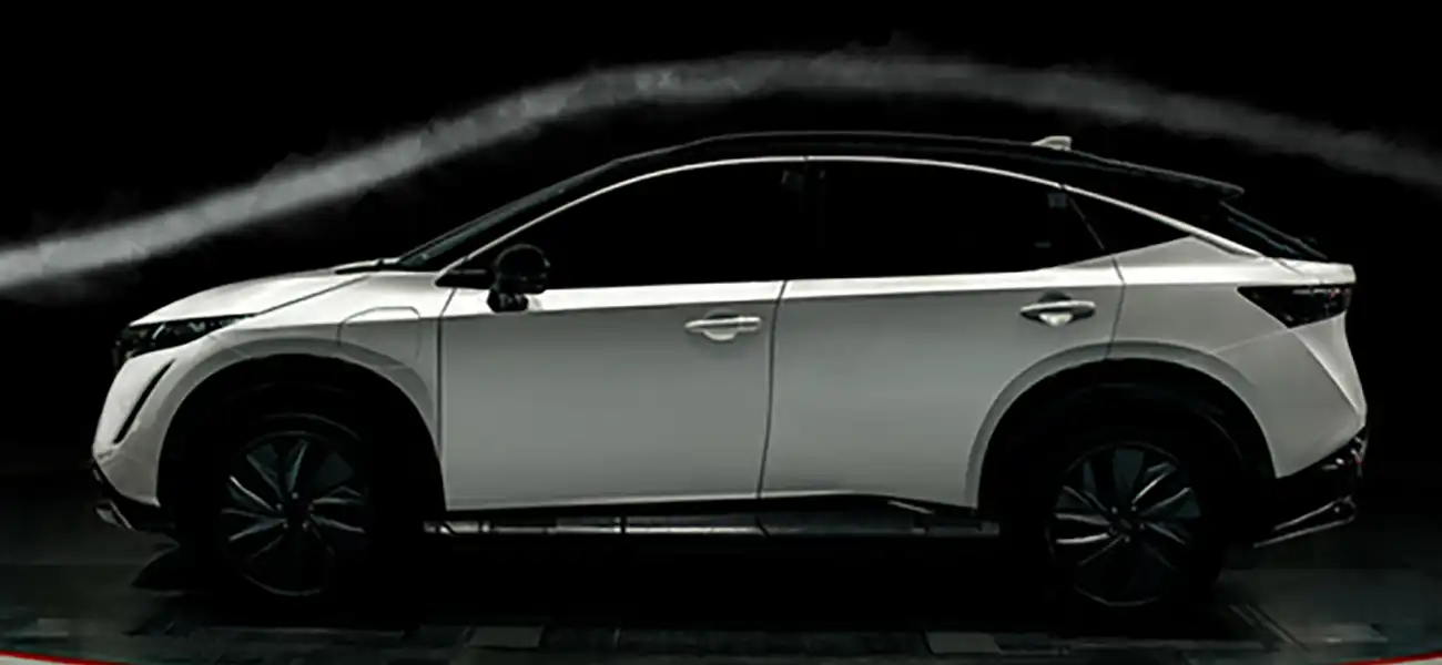 An image showing the aerodynamics of a white Nissan Ariya.