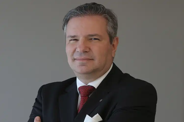 A headshot of Ronaldo Znidarsis