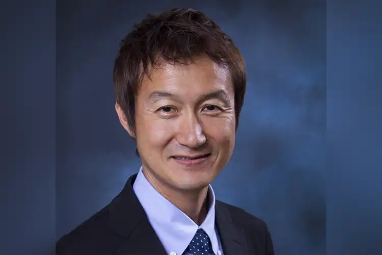 A headshot of Hiroshi Toyoshima