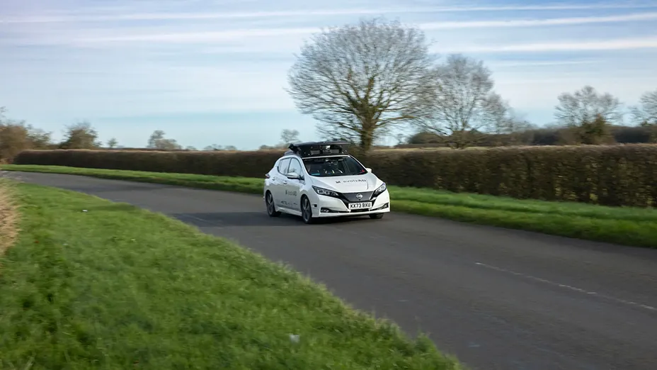 Dynamic front shot of evolvAD on Rural route on a bend