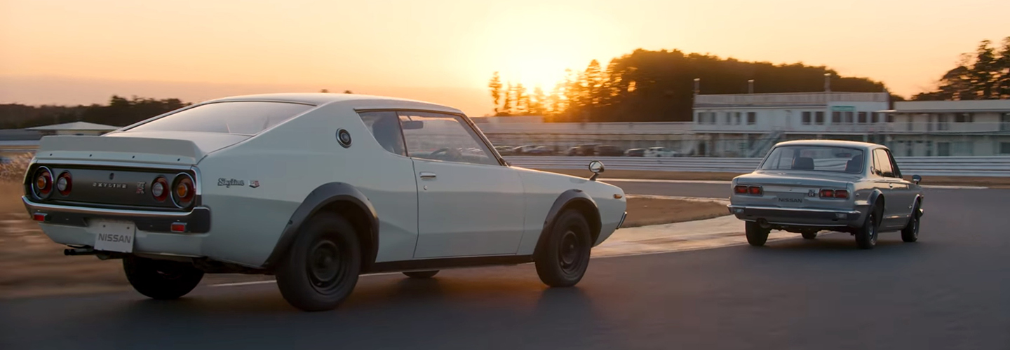 Two classic GT-R's on a track