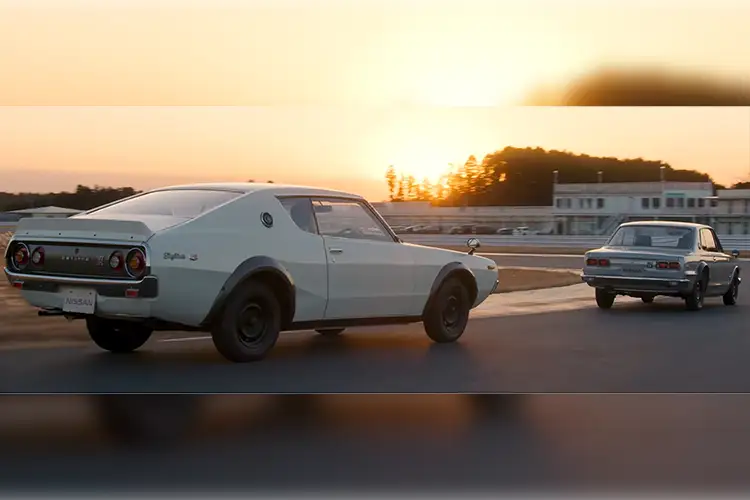 Two Nissan GTRs driving off into the sunset