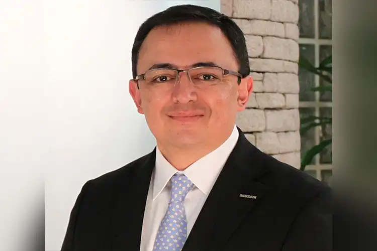 A headshot of Jose Roman