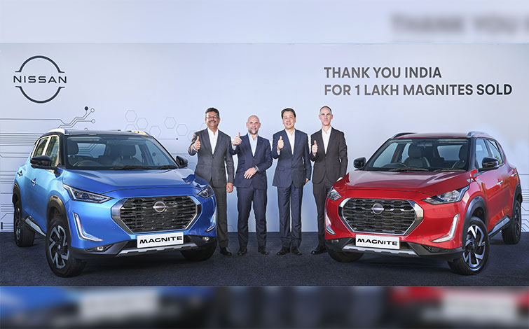 Senior Officials from Nissan posing with the Nissan Magnite for a photoshoot.