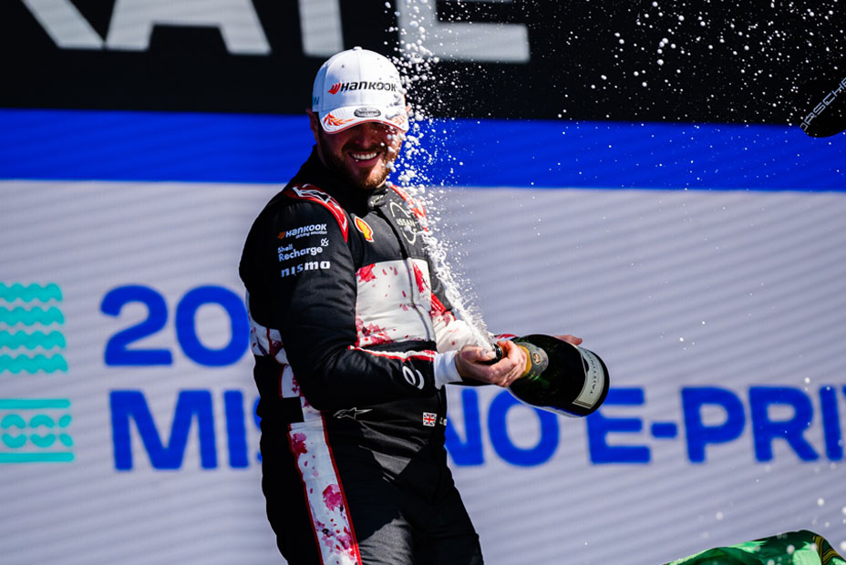 Oliver Rowland celebrates on the podium at the Misano E-Prix