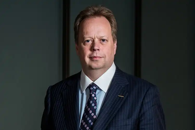 A headshot of Andy Palmer