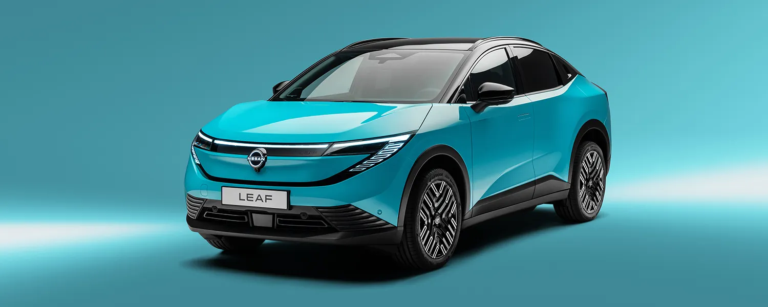 Front three quarter studio image of a blue Nissan LEAF