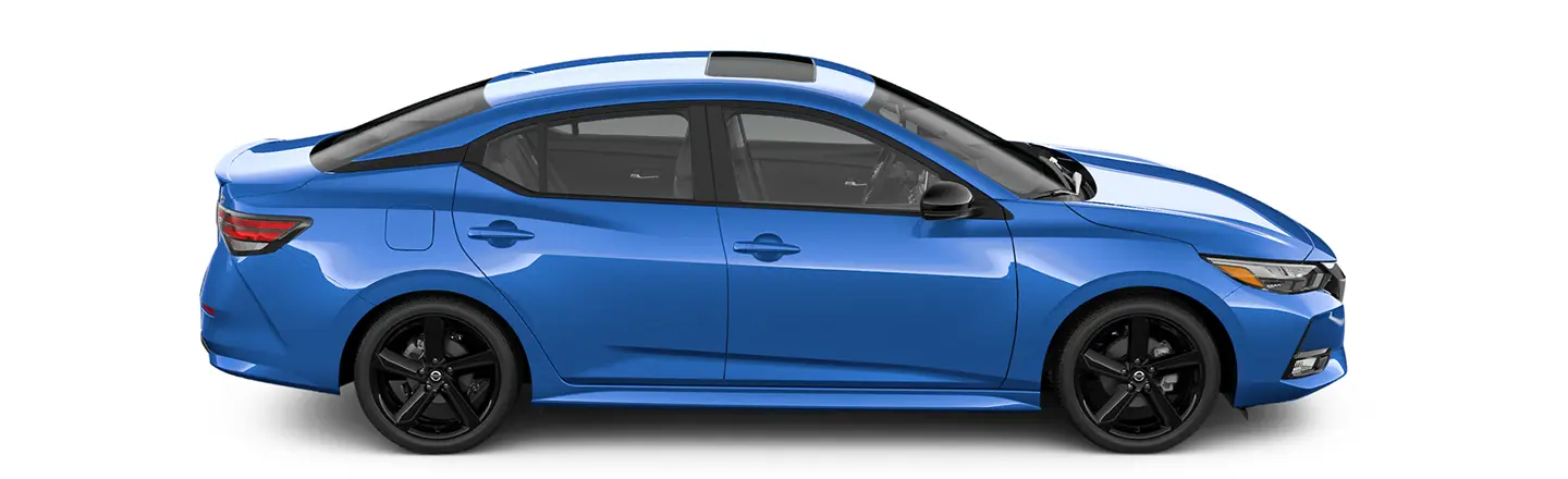 Passenger side view of a blue 2021 Nissan Sentra