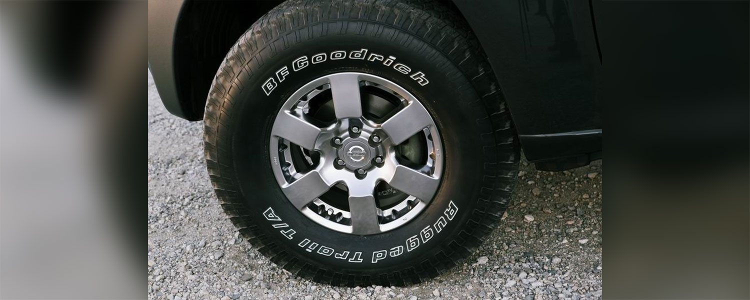A Nissan Xterra alloy wheel and tire