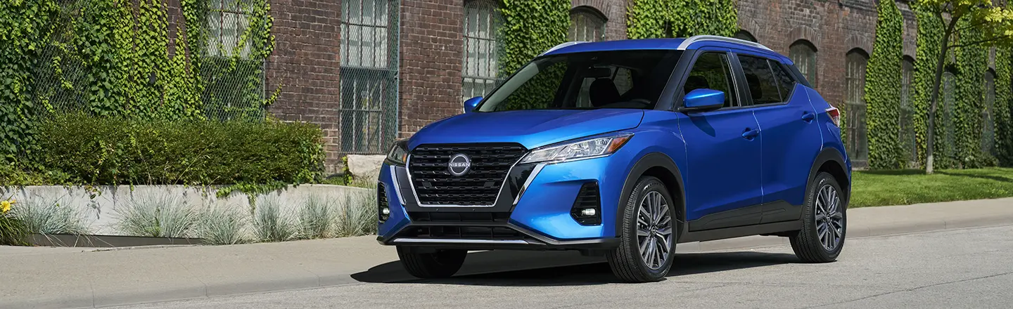 A blue Nissan Kicks parked