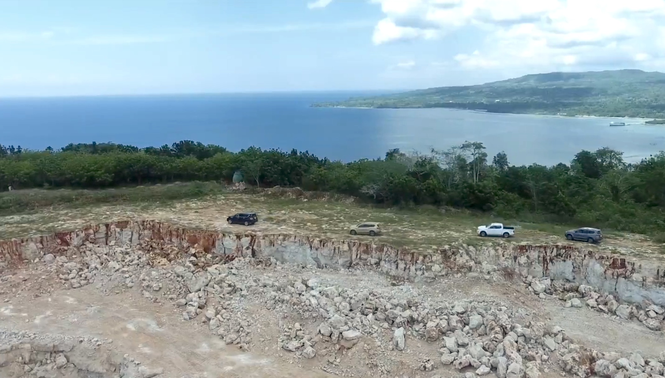 Nissan Patrol, Terra and Navara driving on a cliff side