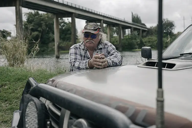 Noel Maynard resting against his Nissan Patrol.