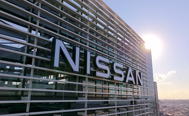 The head quarter building of Nissan Motor in Yokohama, Japan under a morning sky