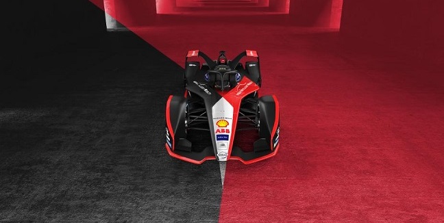 Black, red, and white race car on black and red path